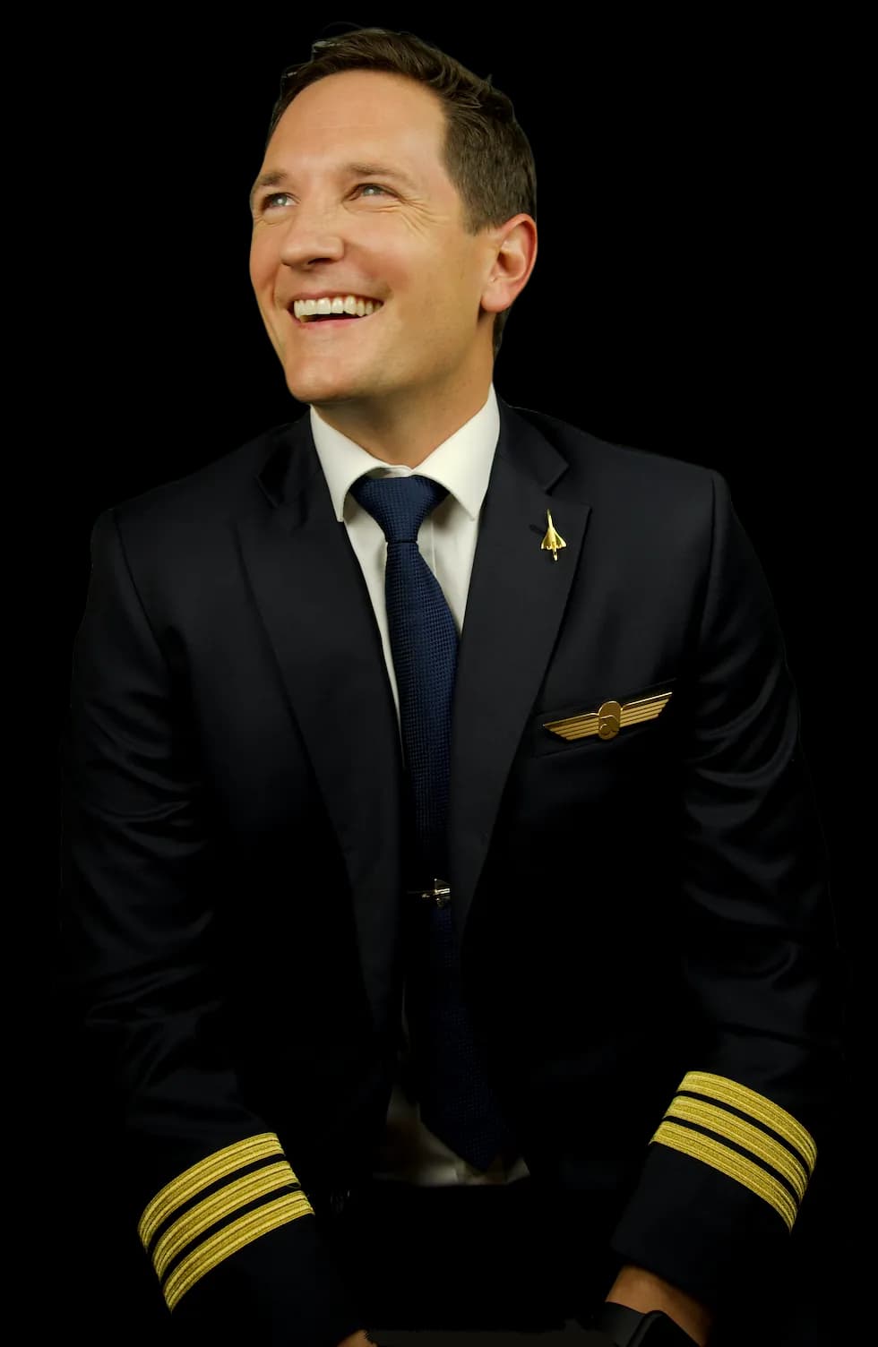 Captain Joe sitting in pilot uniform - Order personalized video messages for birthdays, motivation, or special occasions